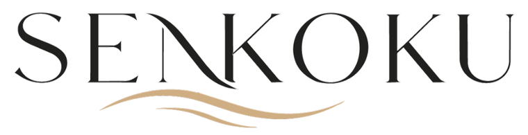 The logo for SENKOKU features the brand name in a black serif typeface with a stylized 'N' and 'K' forming a wave-like design, accented by a flowing tan line underneath, all on a solid white background.